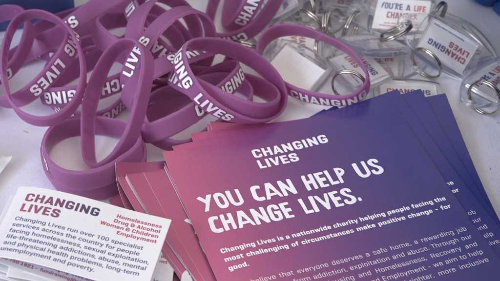 changing lives charity merchandise - leaflets and braceltes